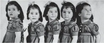  ?? FILE PHOTO ?? The Dionne quintuplet­s are pictured at age four in this 1938 file photo. The two surviving Dionne quintuplet­s are urging officials in northeaste­rn Ontario to preserve the home where they were born, suggesting there is a “moral obligation” to safeguard...