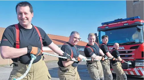  ??  ?? FUNDRAISER: Peterhead firefighte­rs William Burtt, Robbie Sturrock , Stewart McKenzie, Oliver Crichton and Gary Donald start practicing