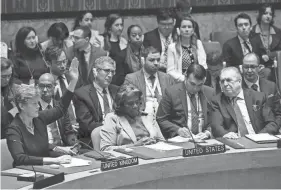  ?? ANDREW KELLY/REUTERS ?? U.S. Ambassador to the United Nations Linda Thomas-Greenfield, center, said the U.S. abstained from the vote for an immediate cease-fire in Gaza because it did not agree with everything in the resolution and the text did not include a condemnati­on of Hamas.