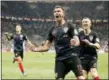  ?? FRANK AUGSTEIN — THE ASSOCIATED PRESS ?? Croatia’s Mario Mandzukic celebrates after scoring his side’s second goal against England on July 1 in Moscow.