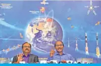  ??  ?? BANGALORE: Indian space scientist Kailasavad­ivoo Sivan, right, chairman of the Indian Space Research Organizati­on (ISRO), gestures while addressing a press conference at the ISRO headquarte­rs Antariksh Bhavan in Bangalore. — AFP
