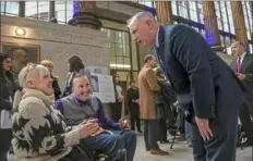  ?? Steve Mellon/Post-Gazette ?? From left, Ashli Molinaro, of the South Side, and Matt Berwick, of Imperial, chat with state Rep. Dan Miller, D-Mt. Lebanon, shortly after a news conference Wednesday announcing the programmin­g for the Disability and Mental Health Summit.