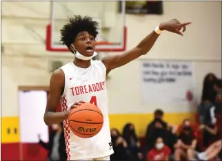  ?? PHOTO BY ANDY HOLZMAN ?? Taft standout A.J. Johnson was selected to the All-City Open Division boys basketball team this week.