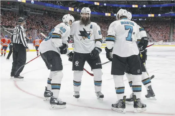  ?? THE CANADIAN PRESS ?? The Sharks celebrate a goal against the Oilers in Game 1. No one should be surprised by the Sharks’ depth, Dan Barnes writes.