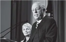  ?? AP PHOTO/MARK ZALESKI ?? Democratic Senate candidate Phil Bredesen speaks to supporters Tuesday after he conceded to Marsha Blackburn in their race for the U.S. Senate. His wife Andrea Conte stands next to him.