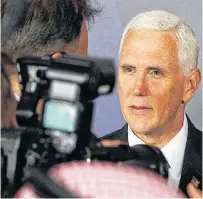  ?? CZAREK SOKOLOWSKI AP ?? U.S. Vice President Mike Pence talks to the media in Warsaw, Poland, on Wednesday. •