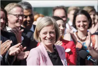  ?? CP PHOTO JASON FRANSON ?? Premier Rachel Notley is applauded at a press conference after speaking about the Kinder Morgan pipeline project in Edmonton on Tuesday.