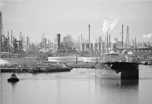  ??  ?? A tanker sails out of the Port of Corpus Christi in Texas after dischargin­g crude oil at the Citgo refinery on Jan 7, 2016. — WP-Bloomberg photo