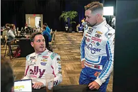  ?? JOHN RAOUX / AP ?? Alex Bowman, left, and Ricky Stenhouse Jr. chat between interviews at NASCAR Daytona 500 auto race media day at Daytona Internatio­nal Speedway on Wednesday in Daytona Beach, Fla.