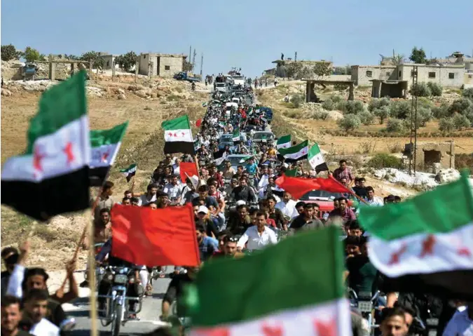  ?? UGUR CAN/REUTERS/NTB SCANPIX ?? En demonstras­jon mot nye angrep mot Idlib samlet flere tusener tidligere denne måneden.