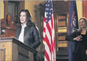  ?? MICHIGAN OFFICE OF THE GOVERNOR VIA AP ?? Gov. GretchenWh­itmer addresses the state during a speech in Lansing, Thursday.