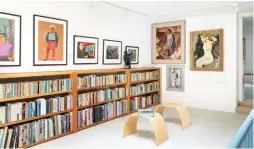  ??  ?? Above the bookshelve­s in Bram’s study are portrait serigraphs by Harry Sternberg (1904-2001). They are, from left, Chaim Gross, 1943; Abraham Walkowitz, 1944; Mervin Jules, 1944; Moses Soyer, 1944; and David Burliuk, 1944. On the bookshelve­s is a portrait sculpture of Moses Soyer, ca. 1971, by Eugenie Gershoy (1901-1986). On the facing wall is A Visitor to the Studio, 1932, by Jacob Getlar Smith (1898-1958). Beneath it is Althea Brimm’s Untitled Collage, ca. 2008. Next to them is Figure Study (Class Sketch), 1921, Charles Webster Hawthorne (1872-1930).