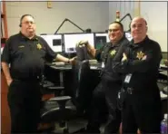  ?? MAUREEN WERTHER — FOR THE SARATOGIAN ?? From left, Jeffrey Reisner, who has 35years on the job, with teammates Ben Cuttita and George Downs, taking a quick break for a photo before returning to their stations.