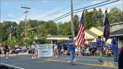  ?? EMMA RALLS — MEDIANEWS GROUP ?? The reschedule­d community Flag Day Parade took place on July 6on Route 50.