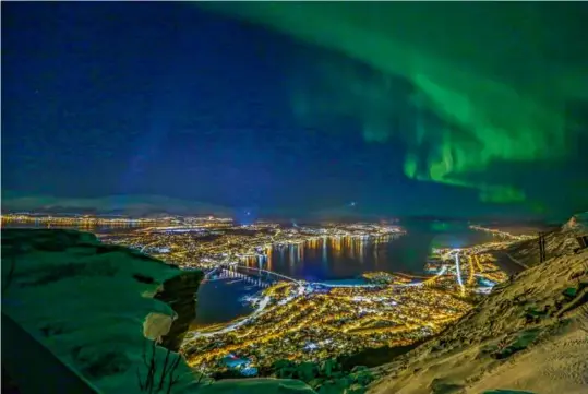  ?? YNGVE OLSEN ?? The northern lights over Trømso, Norway.