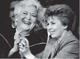  ?? HERALD FILE PHOTO ?? BRIDGING DIVIDES: Barbara Bush and Raisa Gorbachev, wife of Soviet leader Mikhail Gorbachev, appear at Wellesley College in 1990.