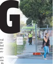  ?? Picture: MARC McCORMACK ?? ON PATROL: Security officers keep watch over the Abbott St site where bat trees are to be removed.