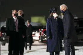  ?? EVAN VUCCI — THE ASSOCIATED PRESS ?? President Joe Biden talks with Col. Adria Zuccaro, Commander of the 128th Air Refueling Wing, as he arrives at General Mitchell Internatio­nal Airport to participat­e in a town hall event at Pabst Theater, Tuesday, in Milwaukee.