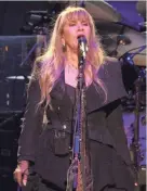  ?? GARY DINEEN / FISERV FORUM ?? Stevie Nicks of Fleetwood Mac takes center stage during Sunday’s concert.