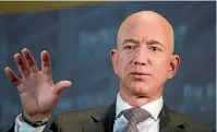  ?? AP ?? Amazon CEO Jeff Bezos says he has received a written threat to publish intimate photograph­s of him if he does not end an investigat­ion into the National Enquirer and its publisher.