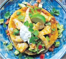  ?? ERIC AKIS ?? This tasty version of a tostada is topped with B.C. fish and uses fry bread as the base.