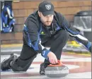  ?? JEREMY FRASER/CAPE BRETON POST ?? Skip Kurt Roach of the Sydney Curling Club focuses and prepares to release the rock during the Nova Scotia Men’s Travelers Curling Club Championsh­ip at the Sydney Curling Club on Friday. The Sydney rink was defeated on Day 1 of the tournament by Tony...