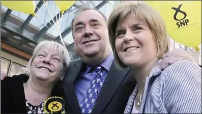  ??  ?? Row: Sandra White campaignin­g in 2011 with then First Minister Alex Salmond and Nicola Sturgeon