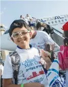  ?? (Nati Shohat/Flash90) ?? FRENCH immigrants arrive at Ben-Gurion Airport in 2017.