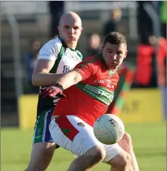  ??  ?? Rathnew’s Mark Doyle reacts as James Tyrrell closes in.