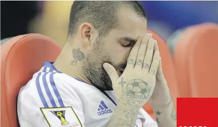  ?? JOHN KENNEY/MONTREAL GAZETTE ?? Andres Romero of the Impact shows his disappoint­ment following the team’s loss to Club America from Mexico at Olympic Stadium on Wednesday night. Club America won 4-2.