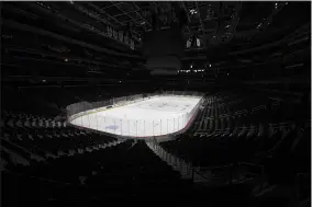  ?? ASSOCIATED PRESS FILE ?? Capital One Arena, home of the Washington Capitals, is empty, but fans dejected by the sports world coming to a temporary halt because of the novel coronaviru­s can find some joy in video games.