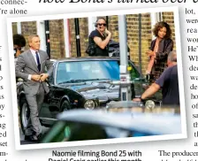  ??  ?? Naomie filming Bond 25 with Daniel Craig earlier this month