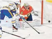  ?? MICHAEL LAUGHLIN/AP ?? Sabres center Tyson Jost (17) tries to score on Panthers goaltender Alex Lyon (34) during the first period of Tuesday’s game in Sunrise.