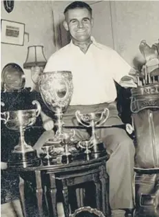  ??  ?? Martin Bains with his collection of Milton Golf Club trophies