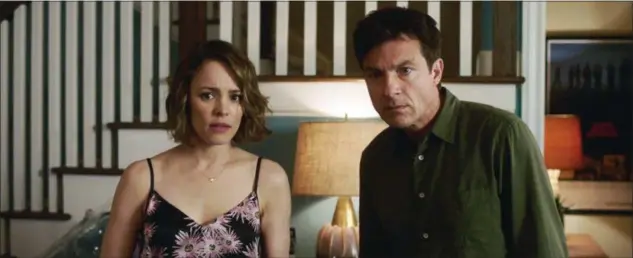  ?? WARNER BROS. ENTERTAINM­ENT ?? Rachel McAdams and Jason Bateman portray a couple that likes to compete with others in “Game Night.”