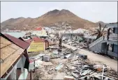  ?? PICTUE: AP ?? A view of buildings partially destroyed by Irma in the French Caribbean island of St Martin.