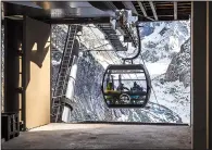  ?? (The New York Times/Darren S. Higgins) ?? A new gondola transports visitors between the Montenvers viewing platform and the Mer de Glace in the French Alps.