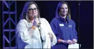  ?? File photo/J.T. WAMPLER ?? Elizabeth Shackelfor­d (left) and Emily Fisher share the stage to represent the Children’s Safety Center during a party for Bikes, Blues & BBQ at George’s Majestic Lounge. The CSC was one of the organizati­ons receiving motorcycle rally funds.