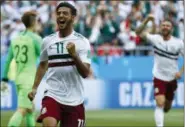  ?? EDUARDO VERDUGO — THE ASSOCIATED PRESS ?? Mexico’s Carlos Vela celebrates after scoring the opening goal during the group F match between Mexico and South Korea at the 2018 soccer World Cup in the Rostov Arena in Rostov-on-Don, Russia, Saturday.