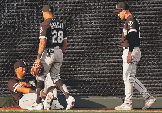  ?? ED ZURGA/GETTY IMAGES ?? Eloy Jimenez (left) was put on the 10-day injured list by the White Sox on Wednesday after he collided with Charlie Tilson (right) in the first inning Tuesday.