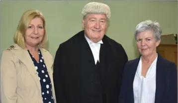  ??  ?? Judge Barry Hickson with stenograph­er Aideen McDonald and Martina O’Connell, court clerk.