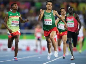  ?? BOB MARTIN/OIS, IOC VIA THE ASSOCIATED PRESS ?? Algeria’s Abdellatif Baka narrowly wins the gold in the men’s 1,500-metre T13 final during the Paralympic Games.