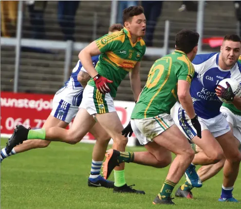  ??  ?? Con Barrett, Kerin’s O’Rahillys, is pursued by South Kerry’s Oran Clifford, Conor O’Shea and Brian Sugrue in last Saturday’s County Senior Football C Stadium, Killarney.