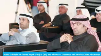  ??  ?? KUWAIT: Minister of Finance Nayef Al-Hajraf (left) and Minister of Commerce and Industry Khaled Al-Roudhan attend the event.