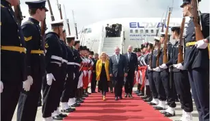  ?? (Avi Ohayon/GPO) ?? PRIME MINISTER Benjamin Netanyahu and his wife, Sara, are greeted by an honor guard upon their arrival in Buenos Aires yesterday.