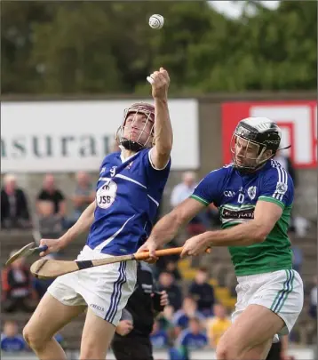  ??  ?? Pa Cullen of Oylegate-Glenbrien wins this tussle with Glynn-Barntown’s Daire Barron in the Pettitt’s Senior hurling championsh­ip clash in Innovate Wexford Park on Saturday.