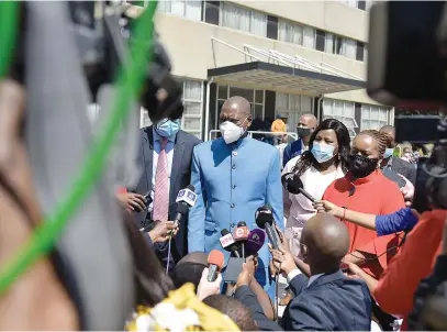  ?? Picture: Neil McCartney ?? WATCHING BRIEF. Health Minister Zweli Mkhize checks on progress at the vaccine centre at Charlotte Maxeke Johannesbu­rg Academic Hospital yesterday.