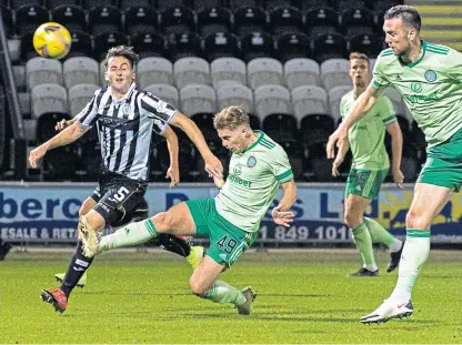  ?? SNS. ?? James Forrest heads home Celtic’s second goal as the Hoops move up into second place.