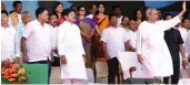  ??  ?? Odisha CM Naveen Patnaik waving at crowd in Cuttack as his ministeria­l colleagues look on.