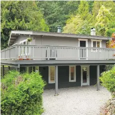  ??  ?? 1238 Scarboroug­h Rd. on Bowen Island was built in 1976. The home has two bedrooms and roughly 1,000 square feet on each floor.